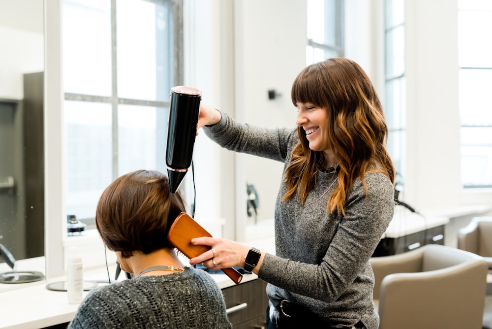 Warm blonde waves styled in a hair salon